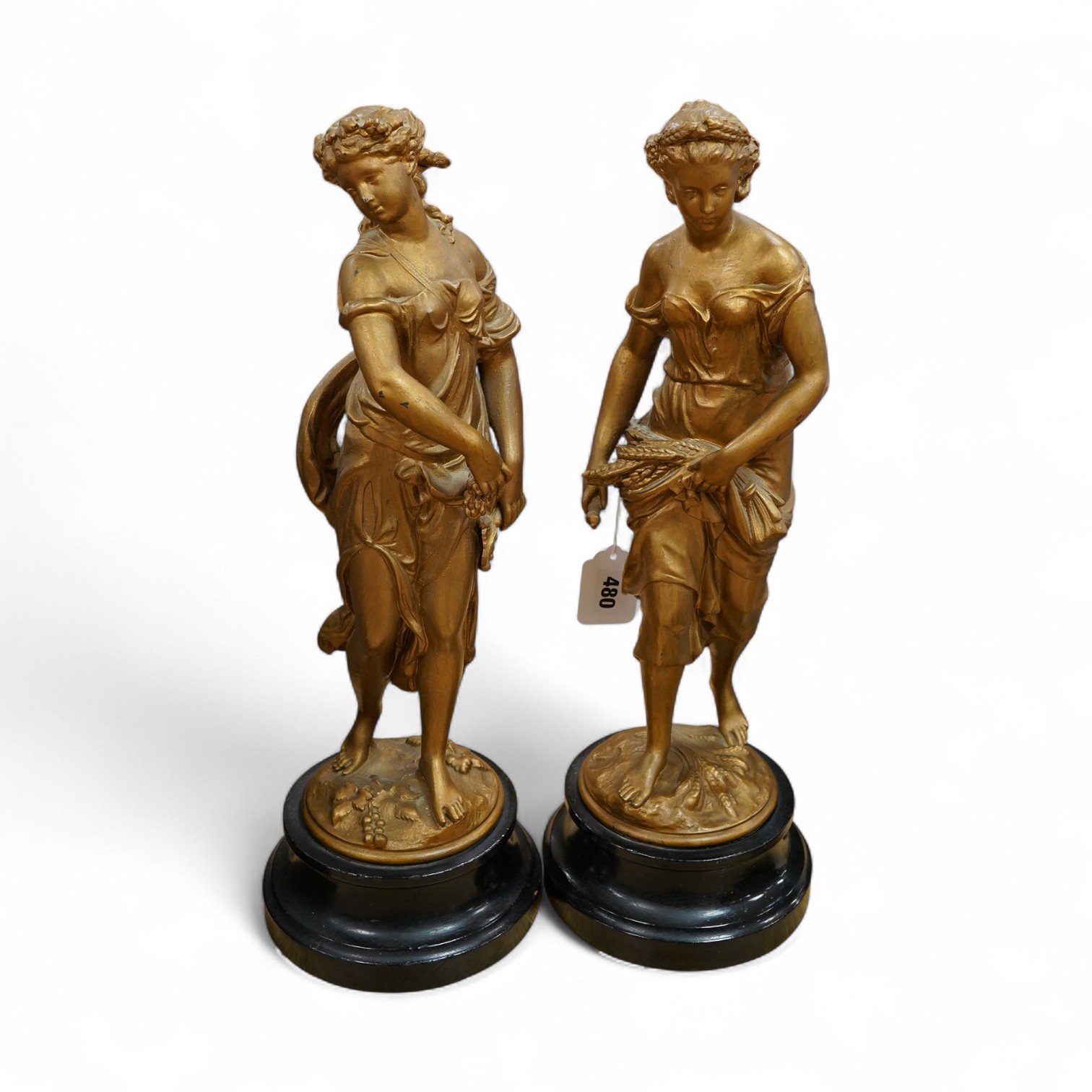 A pair of late 19th century gold-painted spelter figures, 48cm